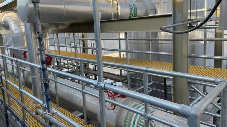 The Precision Crossover: Engineering Safe Access in High-Density Beverage Tank Farms